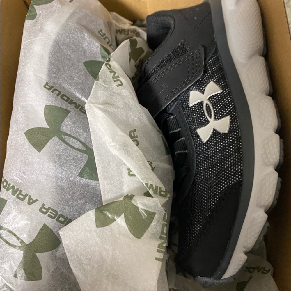 Brand new Under Armour kids shoes